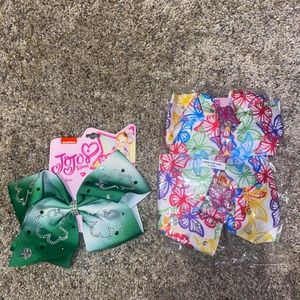 3 Jojo siwa hair bows.